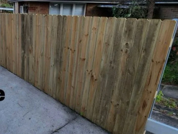 Before: Timber paling fence, bare timber to a painted finish
