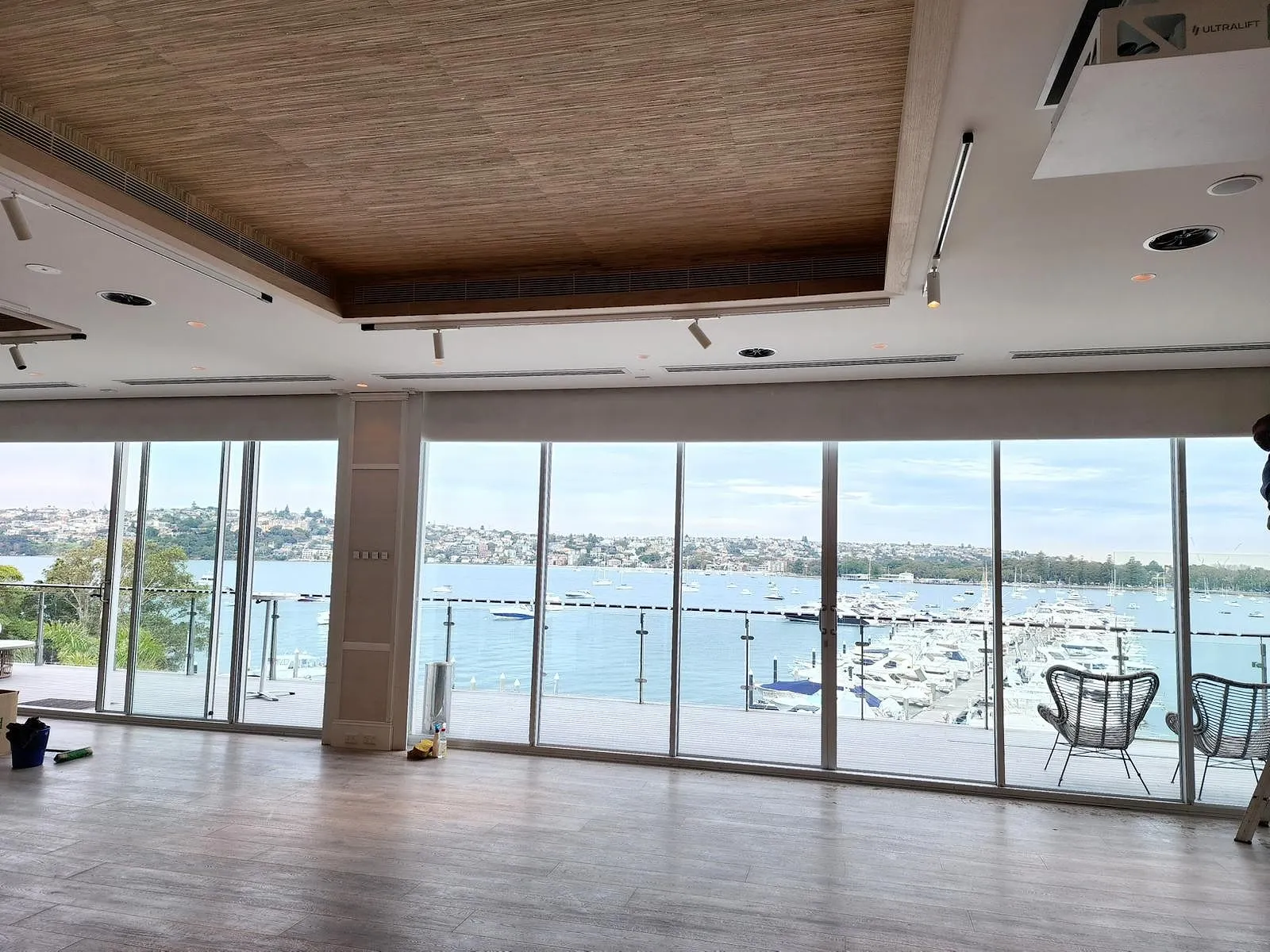 Harbour-view living area, walls and trims finished