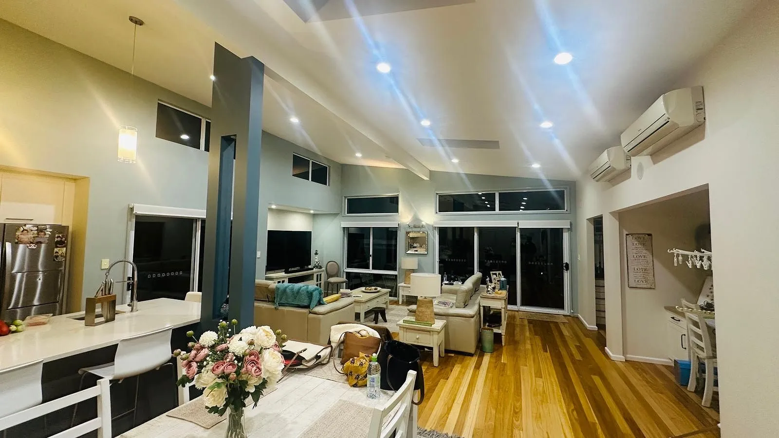 Open-plan kitchen and living, full repaint